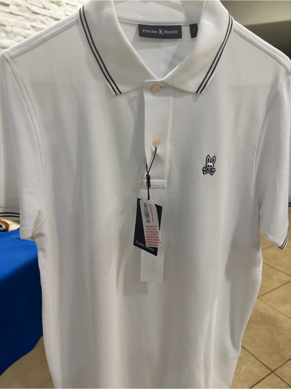 Psycho Bunny White Polo with Navy Contrast Trim